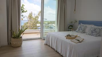 Deluxe Double Room, 1 Queen Bed, Sea View | Premium bedding, minibar, individually decorated, individually furnished