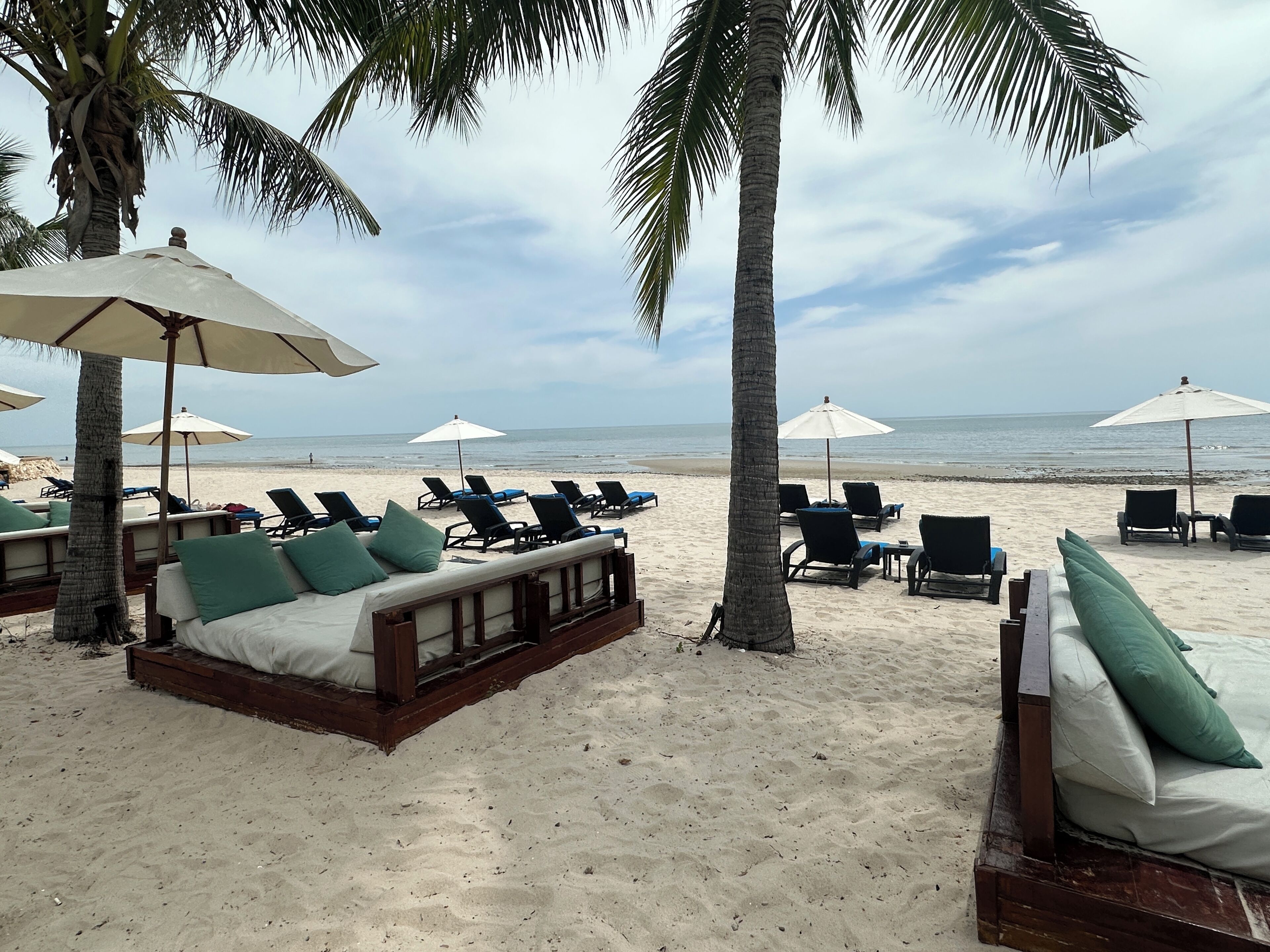 On the beach, sun loungers, beach towels