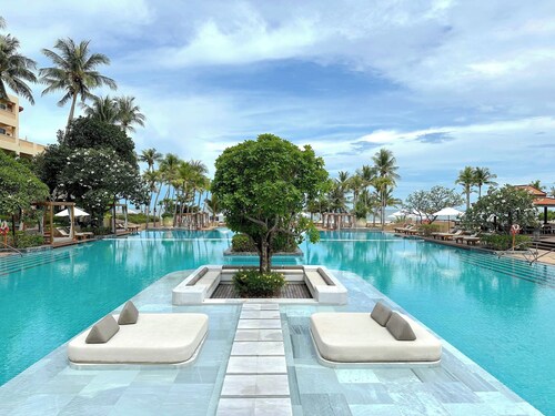 ETW am Strand mit Meerblick und die Einrichtungen eines 5-Sterne-Resort