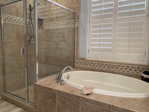 Combined shower/tub, hair dryer, towels, soap