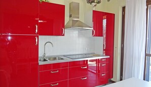 Fridge, coffee/tea maker, electric kettle, toaster