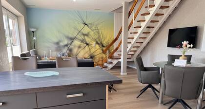 1/2 house built directly on the house with separate entrance over 2 floors
