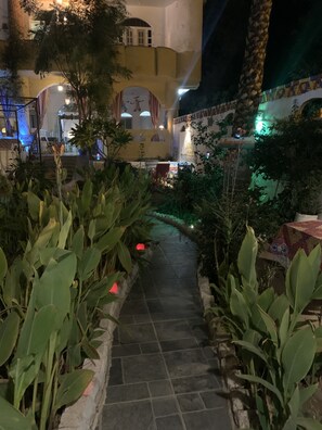 Deluxe Room, Multiple Beds, Private Bathroom | Terrace/patio