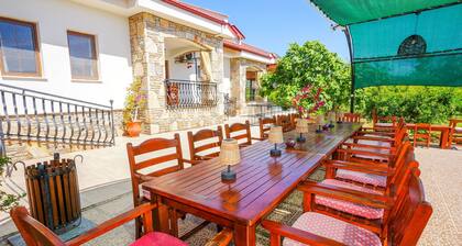 Pomegranate Garden Villas. Three villas, 12 - 21 guests. Two swimming pools.