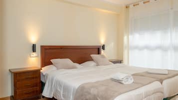 2 habitaciones, tabla de planchar con plancha, cuna de viaje y wifi