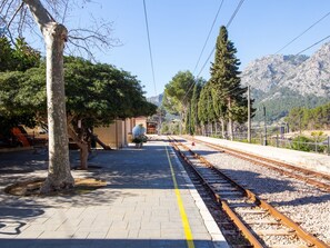 Stand on the platform and take in the breathtaking views of the surrounding mountains.
