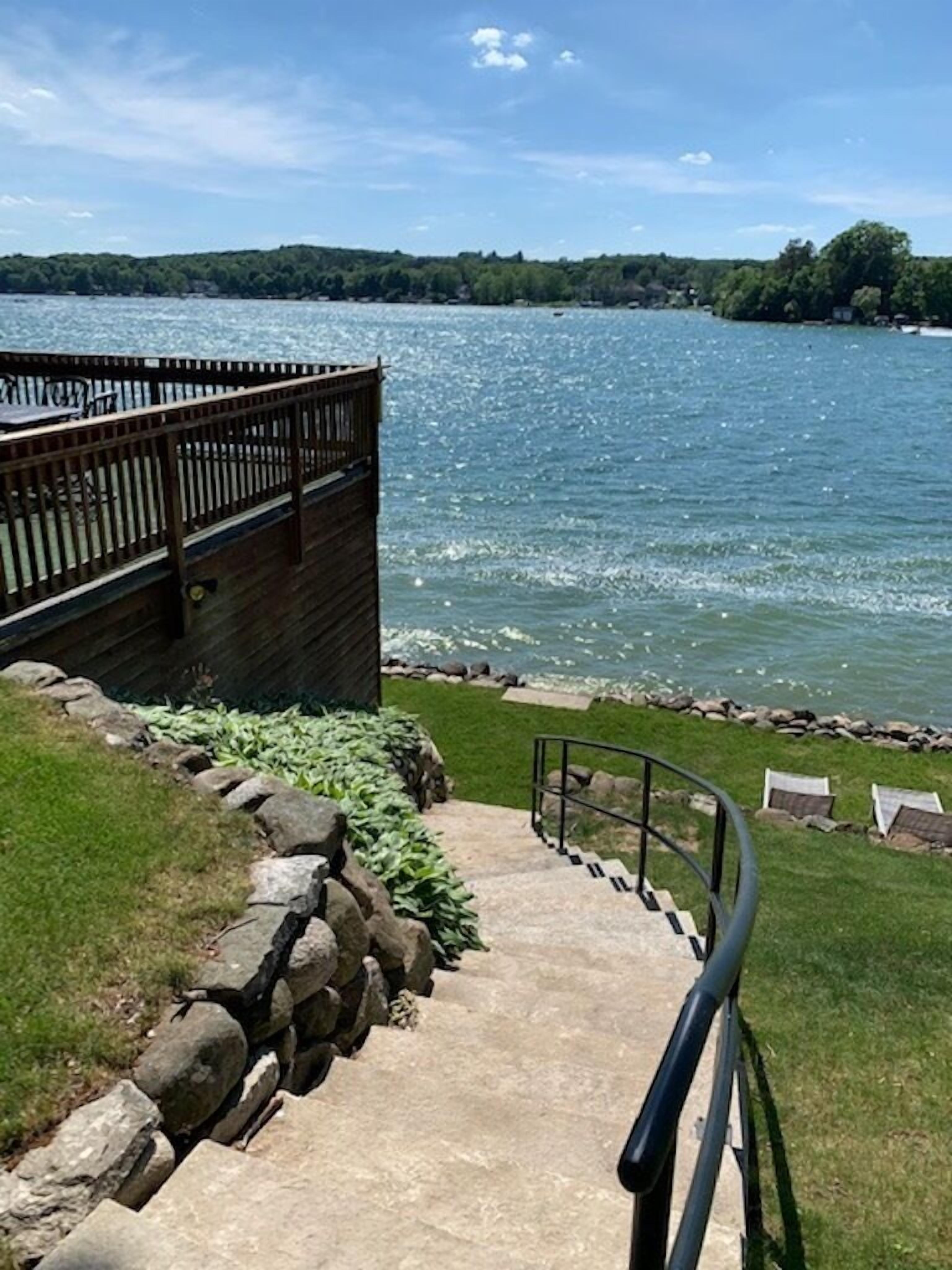 Big Cedar Lake, 125 feet of sandy frontage, beautiful shore, sunsets, spacious