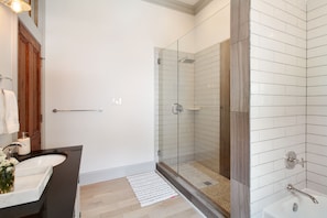 Bathtub, hair dryer, towels, soap - Sophisticated Marigny Triangle Open Concept Home with Balcony (New Orleans)