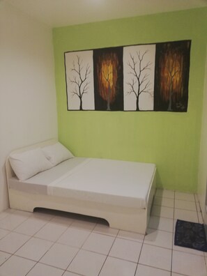 Standard Room | Bed sheets - Dormitels.ph Ermita (Manila)