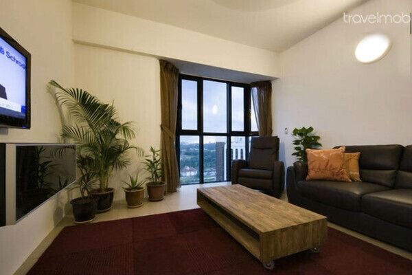 Living room with 42" Samsung Smart TV and 70 cable TV stations