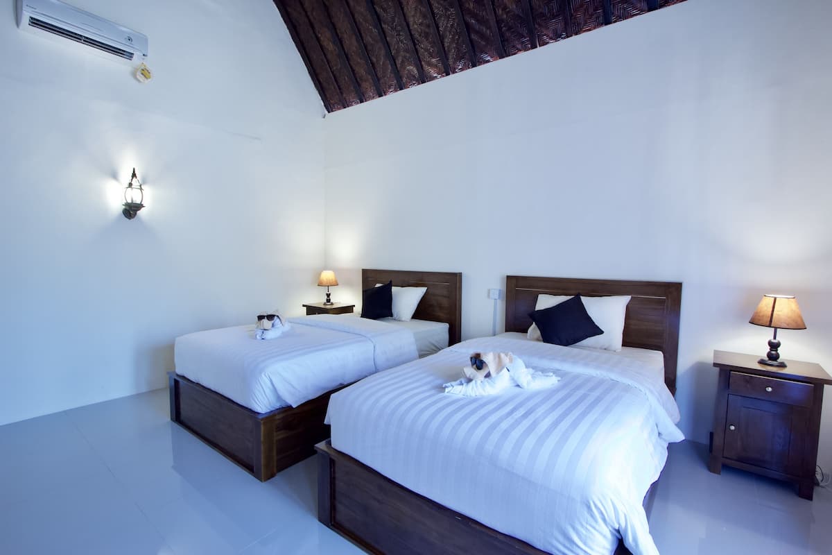 Habitación Deluxe con 1 cama doble o 2 individuales | Caja fuerte y wifi gratis
