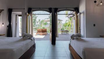 Suite panorámica, varias camas, vista al mar (#2) | Ropa de cama de alta calidad y minibar