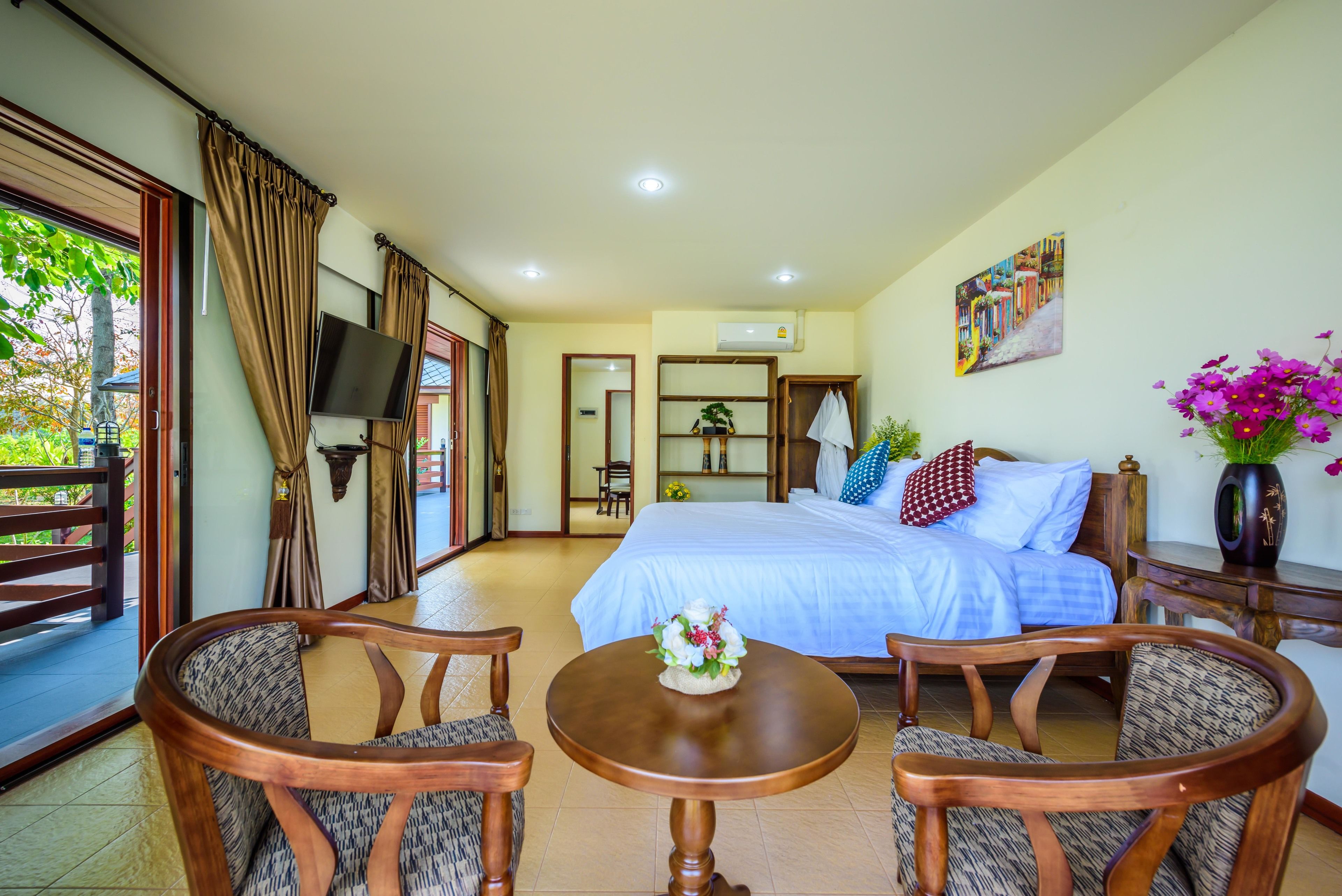 family villa, 2 bedrooms, kitchen, garden view | frette italian sheets, premium bedding, down duvets, memory-foam beds