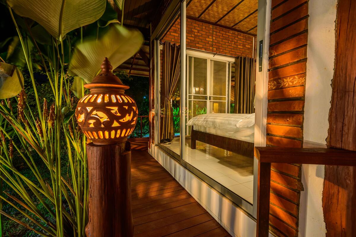 Vila empresarial, 1 cama Queen, terraço, vista para o jardim | Vista para o jardim