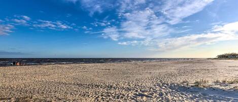 On the beach, sun-loungers, beach towels