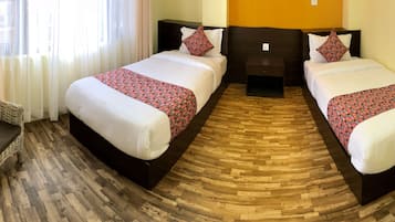 Deluxe Double or Twin Room, Multiple Beds, Non Smoking, City View | 1 bedroom, premium bedding, individually decorated
