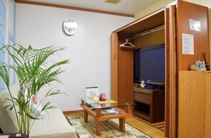 Appartement | Coin séjour | Télévision à écran plat