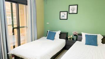 Camera con 2 letti singoli, 2 letti singoli, non fumatori | Wi-Fi gratuito, lenzuola