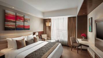 Suite, 1 Double Bed | Minibar, in-room safe, soundproofing, iron/ironing board (on request)