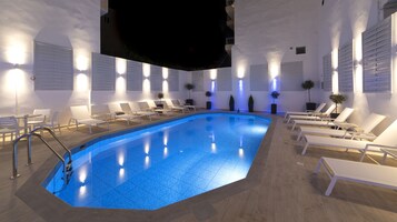 Seasonal outdoor pool, open 7:00 AM to 9:00 PM, sun loungers