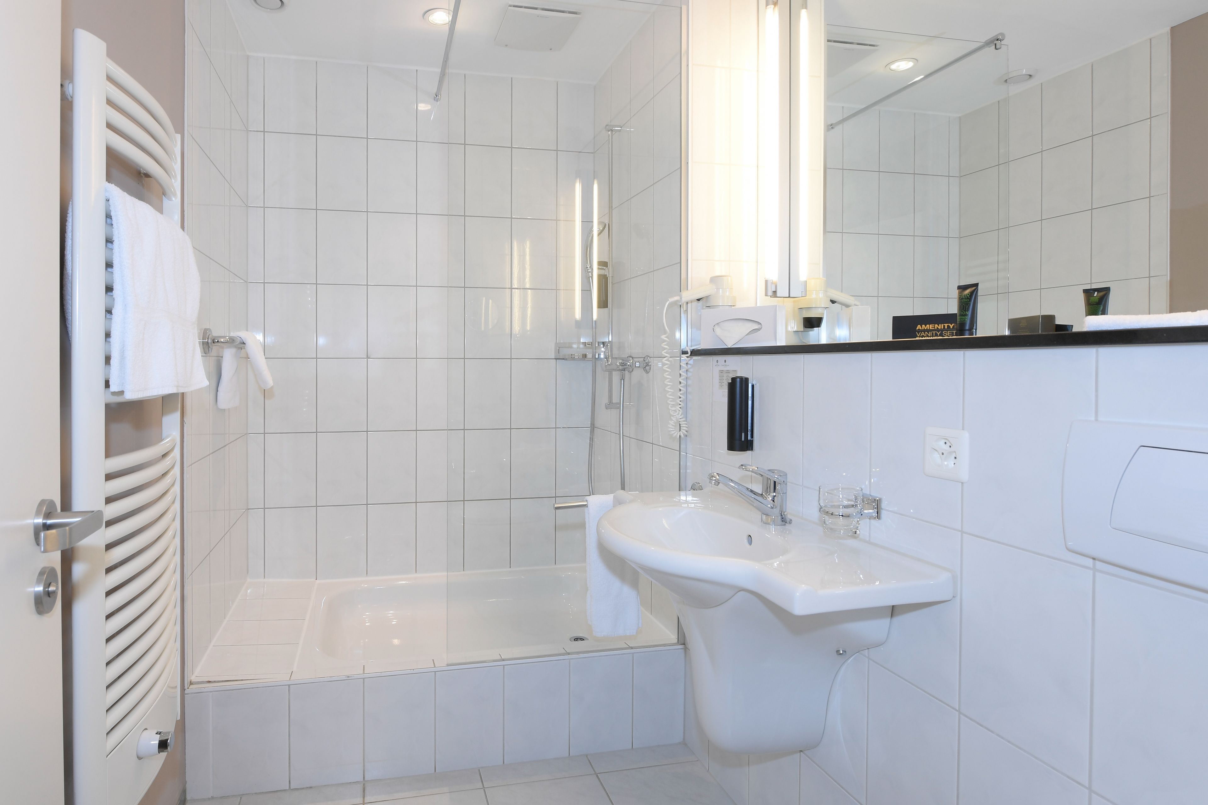 family twin room, 2 queen beds, non smoking | bathroom | free toiletries, hair dryer, slippers, towels