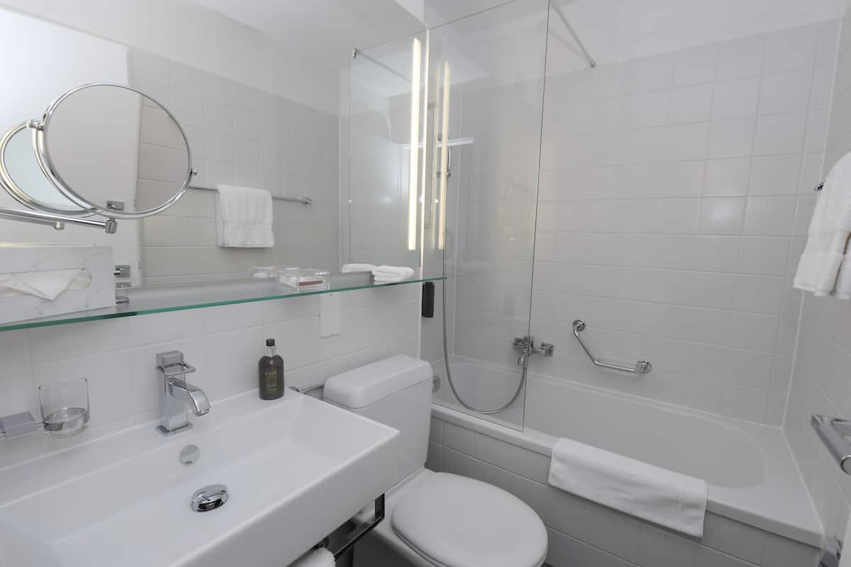 classic double room, 1 queen bed, non smoking | bathroom | free toiletries, hair dryer, slippers, towels