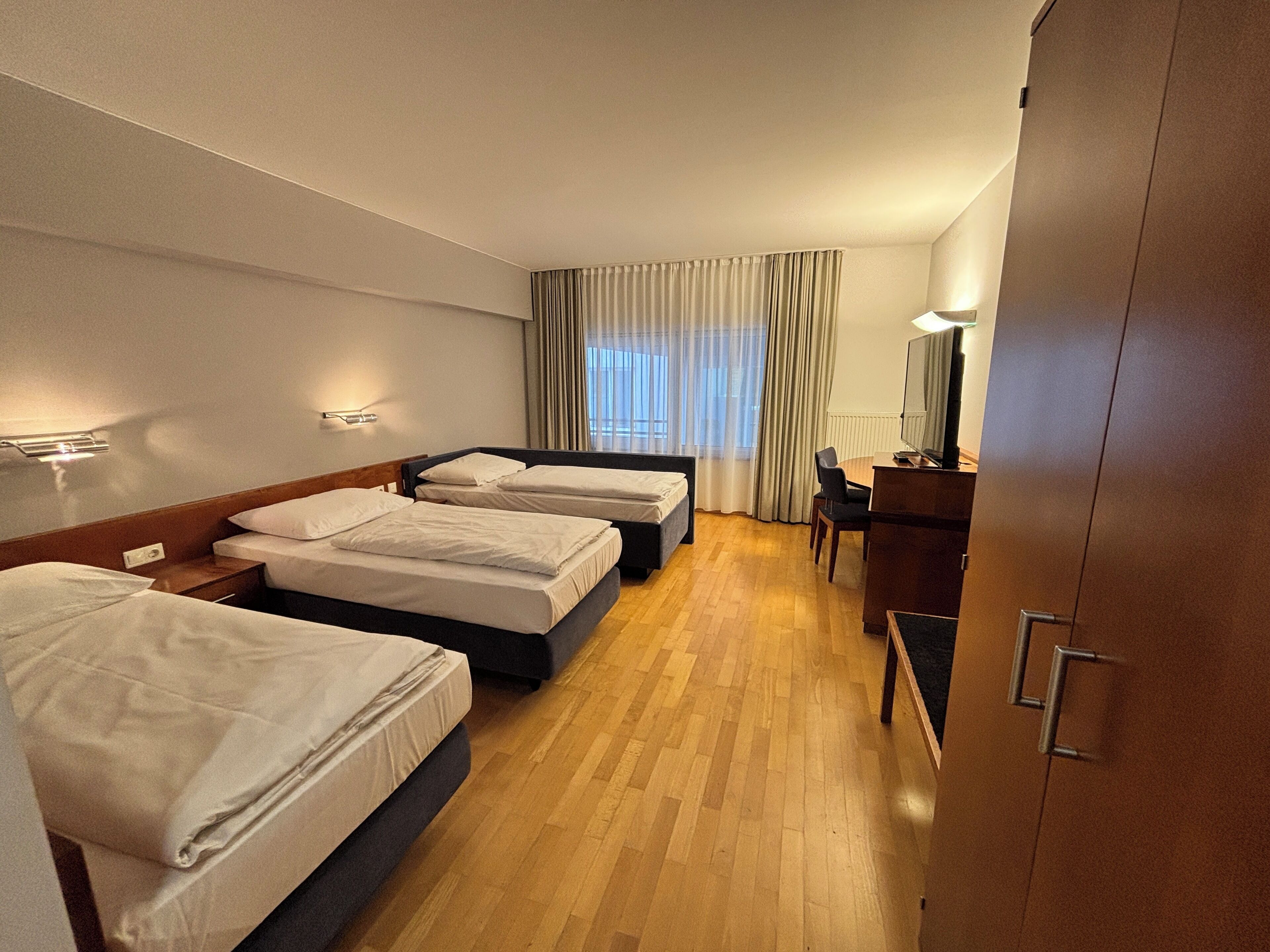 Comfort Triple Room | Individually furnished, desk, blackout curtains, soundproofing