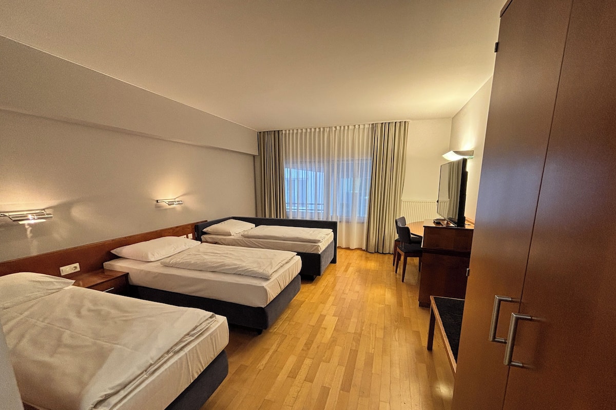 Comfort Triple Room | Individually furnished, desk, blackout curtains, soundproofing