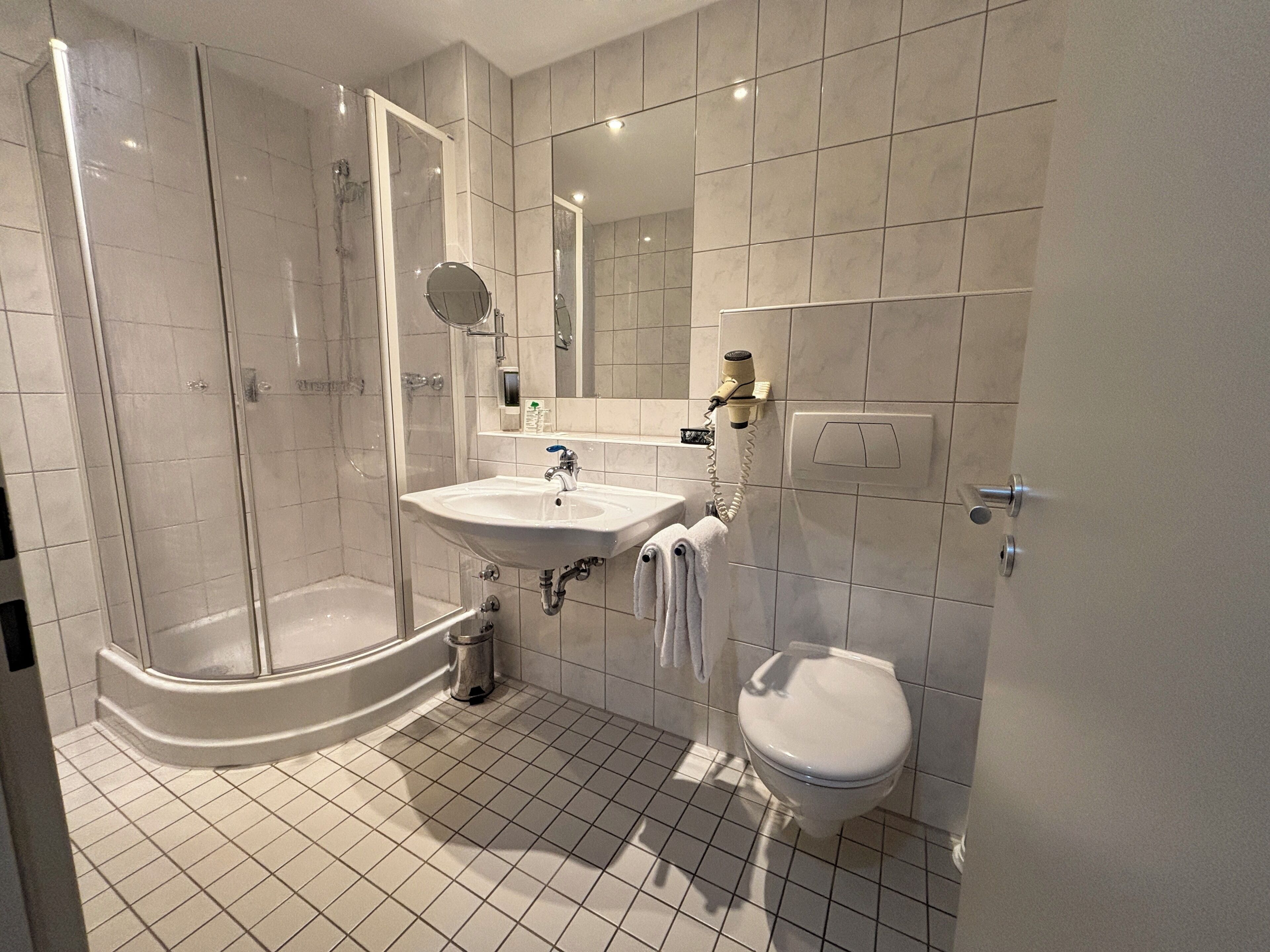 comfort single room | bathroom | shower, hair dryer, towels