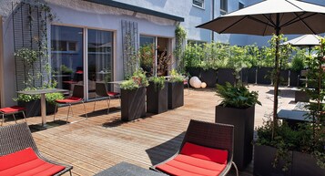 Quarto triplo conforto | Terraço/pátio