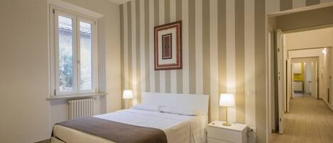 Deluxe Apartment, 2 Bedrooms | Hypo-allergenic bedding, memory-foam beds, in-room safe