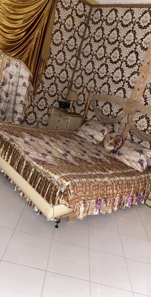 Appartement, niet-roken, uitzicht op tuin | 2 slaapkamers, een strijkplank/strijkijzer, beddengoed