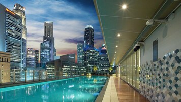 Outdoor pool, open 6:00 AM to 10:00 PM, sun loungers