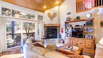 Family Cabin, 4 Bedrooms (4 Bedrooms) | Living area | Flat-screen TV, DVD player, foosball, video library