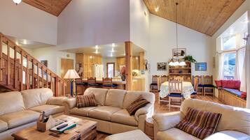 Family Cabin, 4 Bedrooms (4 Bedrooms) | Living area | Flat-screen TV, DVD player, foosball, video library