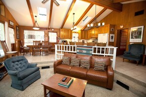 Family Cabin, 5 Bedrooms (5 Bedrooms) | Living area | Flat-screen TV, fireplace, books - The Tree House II (Yosemite National Park)