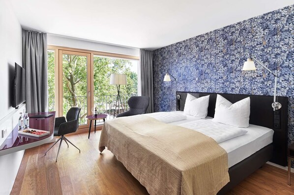 Literie hypoallergénique, minibar, coffres-forts dans les chambres