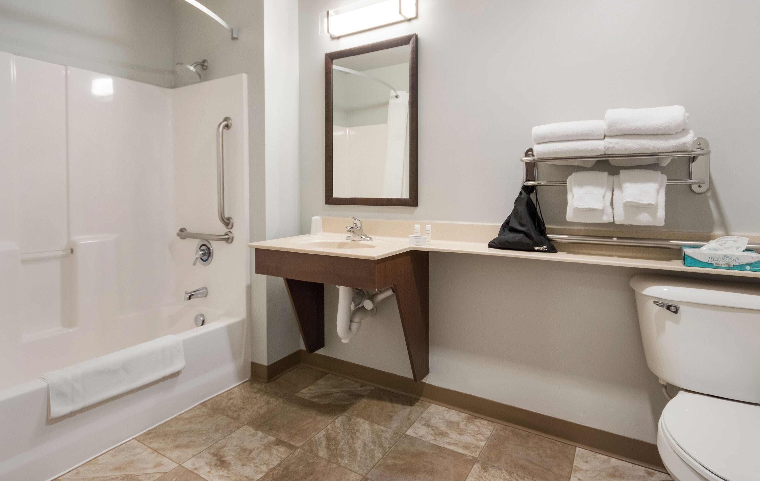 combined shower/bathtub, free toiletries, hair dryer, towels