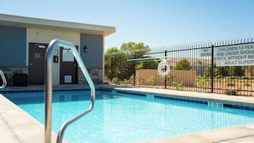 Outdoor pool, open 6:00 AM to 11:00 PM, sun loungers