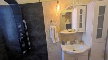 Hair dryer, towels, soap, shampoo