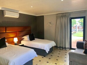 Garden Studio 1 | Blackout curtains, iron/ironing board, free WiFi, bed sheets - Modern Goldfields Apartments (Matjhabeng)