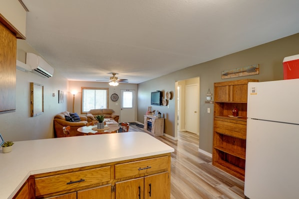 TV, fireplace, books - 'Sacajawea Suite 1' w/ Deck in Heart of Medora! (Medora)