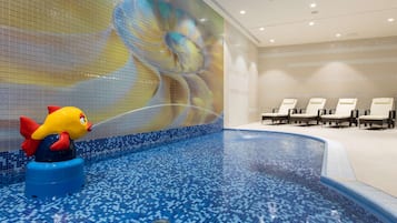 Indoor pool, open 6:30 AM to 9:30 PM, pool loungers