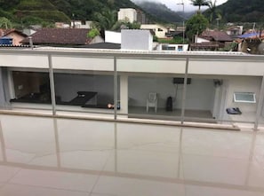 Aerial view - Casa com piscina em Caraguatatuba (Caraguatatuba)