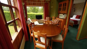 Family Cabin, Multiple Beds, Accessible, City View | Living area | Plasma TV