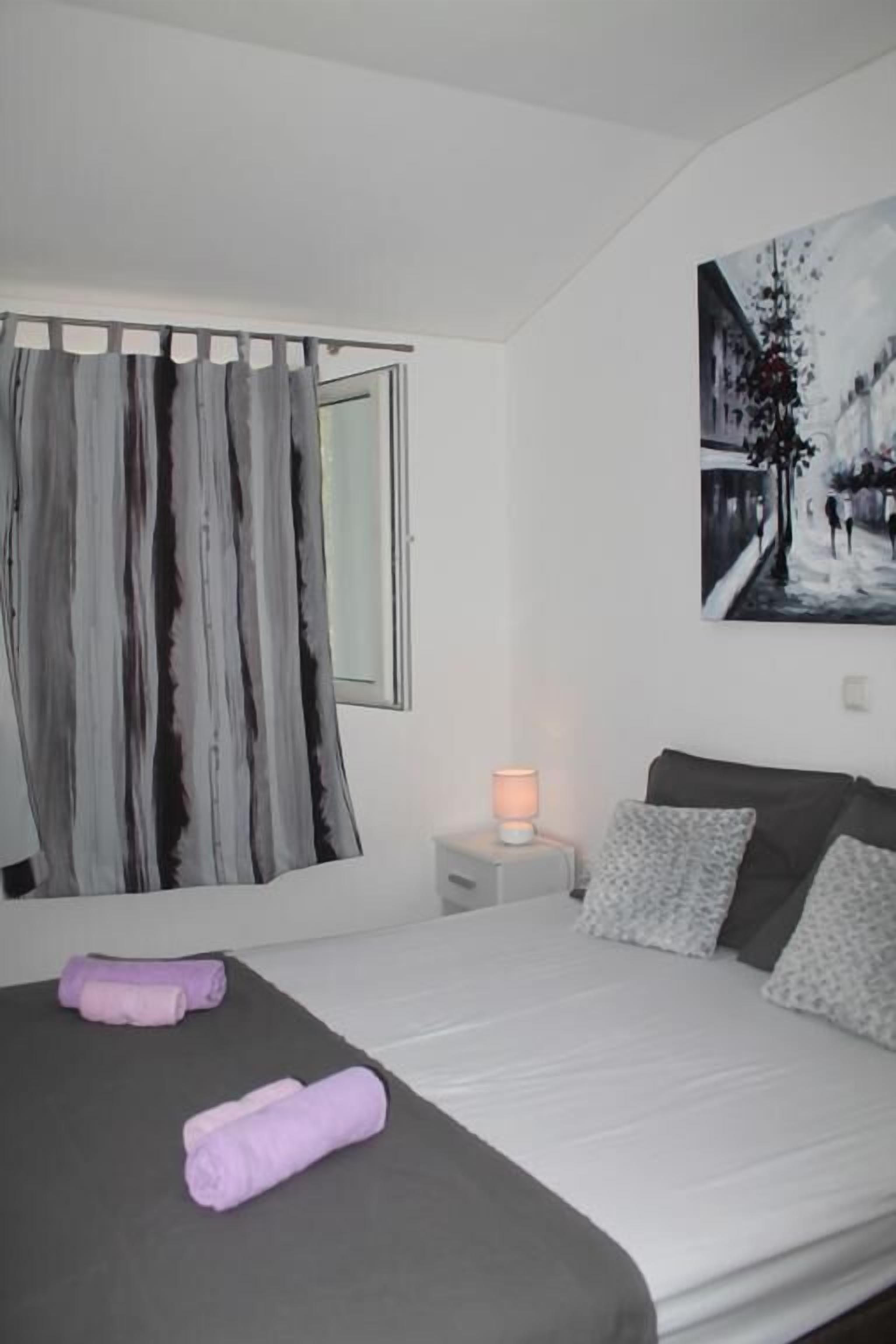 Comfort Apartment, Multiple Beds, Non Smoking, Partial Sea View | 2 bedrooms, individually decorated, individually furnished