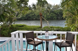 Outdoor dining - Waterfront 4BR Siesta Key home w/heated pool -Spring promotion May/June! (Sarasota)