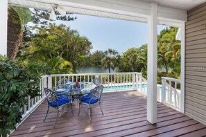 Outdoor dining - Waterfront 4BR Siesta Key home w/heated pool -Spring promotion May/June! (Sarasota)