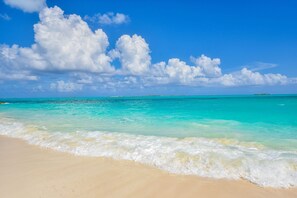 On the beach, sun loungers, beach umbrellas, beach towels