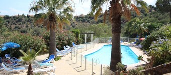 Semi-detached villas ** with communal pool in beautiful property. Ideal with family.